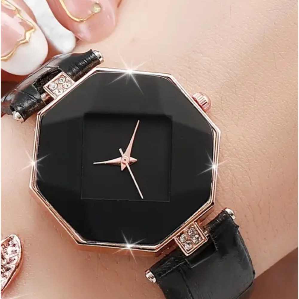 Women’s Watch. Beautiful elegant rose gold colored w/ black strap & rhinestones.